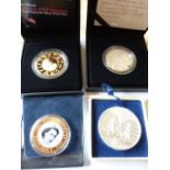 A boxed Royal Mint official London 2012 Olympic gold plated 5 Pound silver proof Coin together with