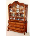 A large early 19th Century Dutch walnut and marquetry Display Cabinet on Chest,