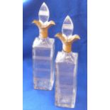 A pair of silver mounted glass Decanters/Scent Bottles,