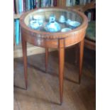 A late 19th/early 20th Century circular satinwood Bijouterie Table,