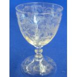 A single clear glass Goblet very finely engraved with eagles,