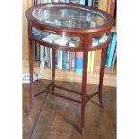 An early 20th Century oval mahogany Bijouterie Table on square tapering slightly splaying legs