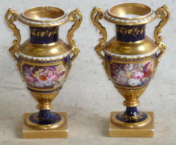 A pair of early 19th Century two handled hard paste porcelain Vases,