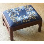 A small George III period mahogany Stool having drop in needlework seat and square moulded legs