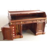 A large and fine tambour topped mahogany Writing Desk,