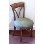 An early 19th Century Dutch walnut and floral marquetry Salon Chair,