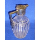 A cut glass and silver mounted Claret Jug, makers mark of Walker & Hall,