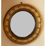 A 19th Century circular gilt framed convex "bull's eye" style Looking Glass, (some gilding away),