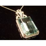 A superb 35 carat aquamarine and diamond cluster Pendant on an 18 carat white gold Chain