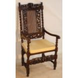 A late 17th Century walnut open Armchair,