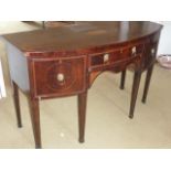 A George III period bow fronted mahogany and satinwood crossbanded Sideboard,