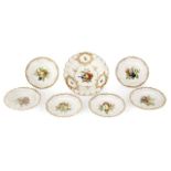 MEISSEN Ensemble comprenant un plat rond et six assiettes à dessert en porcelaine à décor polychrome