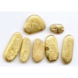 LOT DE SEPT LINGOTINS D'OR A LOT OF SEVEN GOLD INGOTS. POIDS?: 140,95?gr (4,97 OZ.)