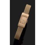 BOUCHERON ANNéES 60 Petite montre bracelet de dame en or rose avec boîtier rectangulaire et cadran