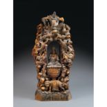 STATUETTE D'AVALOKITESVARAen bois laqué et doré, représenté assis en dhyanasana, la main droite en