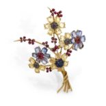 VAN CLEEF & ARPELS ANNEES 1940A blue and yellow sapphire, ruby, diamond and gold brooch by VAN CLEEF