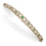 An emerald, diamond and gold bracelet, circa 1880.