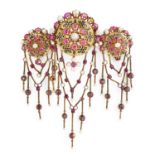 A ruby, natural pearl, enamel and gold stomacher, circa 1850.