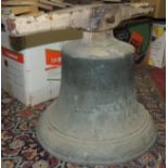 A cast bell "Llewellins & James Bristsol 1870" on original metal mounts, bell 35cms high, lacks