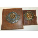 A 19th Century embossed tin fire mark "Bath Sun Fire" 18.5cms high mounted on a wood plaque together