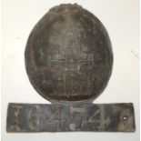 A 19th Century Royal Exchange lead fire mark numbered beneath, 20cms high (lacks crown)