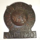 A 19th Century embossed tin fire mark "London Assurance Incorporated AD 1720" centred with naive