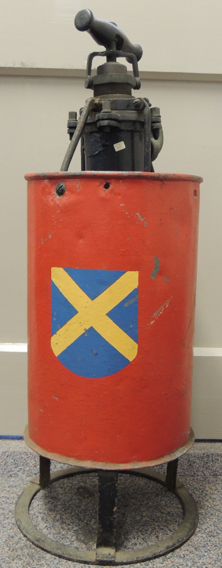 An early St Albans hand operated fire extinguisher the red painted metal "bucket" with St Albans