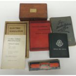 An original box of Eveready Sunshine Carbons; a St John Ambulance Official Drill Maual; booklet