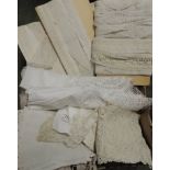 A quantity of lengths of white cotton broderie anglaise trimmings on their original cards; some