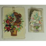 A Victorian mechanical chromo litho New Year greetings card of basket of flowers and two large