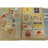 Two scrap albums glued with a varied selection of early 20th Century drinks bottle labels