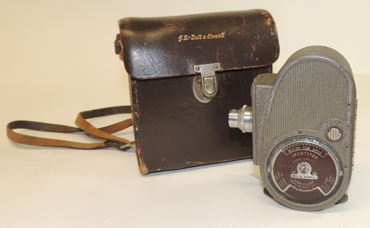 A Bell & Howell Sportster cine camera in brown leather case