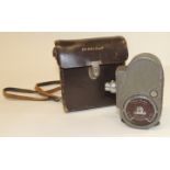 A Bell & Howell Sportster cine camera in brown leather case