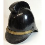 An early black leather firemans helmet with high comb and brass band to the front ++lacks side