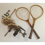 An Edwardian table tennis game with two wood and string rackets, a net and table fastenings ++with