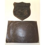 A 19th Century embossed metal fire mark "London & Lancashire Fire" 23cms high mounted on wood shield