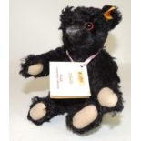 A modern Steiff "Othello" black teddy bear (replica of the "mourning" bear sold after the Titanic