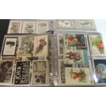 A collection of approx 520 early decorative greetings postcards , many chromo litho examples,