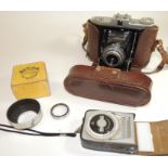 A Zeiss Ikon Nettar folding camera with 6.3 75mm lens and Vario shutter in original brown leather