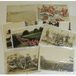 Ten postcards relating to the Somerset Light Infantry including marching troops, camps and artists