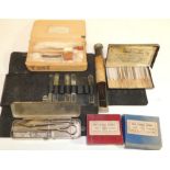A Blood Collecting outfit in original wood box; a suture removal/stapling set in stainless steel