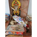 A quantity of dolls, Rocket shot bagatelle board, books and other toys contained in a suitcase