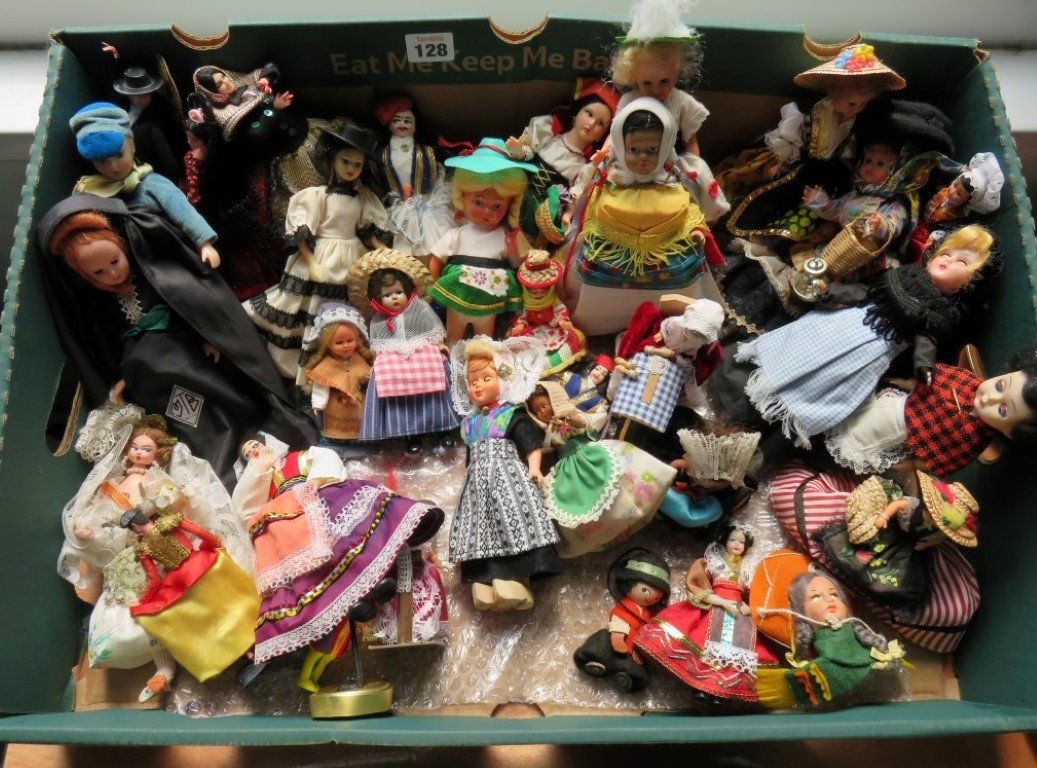 A large collection of souvenir costume dolls