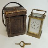 A late 19th Century French brass cased carriage clock with repeat mechanism. Having white enamel