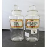 Two chemists bottles with stoppers "Pot lodid" and "Acid Boric Cryst"