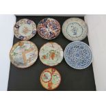 Japanese Imari plates; a Chinese blue and white plate and other Oriental plates