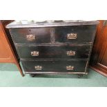 A small Victorian stained pine chest of two short and two long drawers on short baluster feet