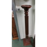 A Victorian mahogany torchere plant stand, fluted column with acanthus decoration on square base