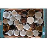 A collection of ceramic tankards including moulded "cheerio" and others