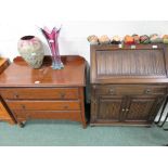 A 20th Century fall front bureau, fitted cupboard doors to base, narrow drawer above, the interior